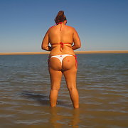 Just hanging out at the beach in my thong
