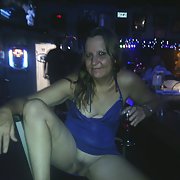 Having a little daring fun at the bar in her slutty blue dress