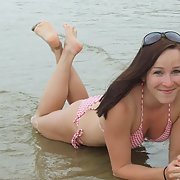 Homemade amateur photos outdoors in swimsuit at the beach