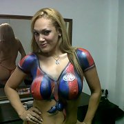 Pole dancing slut with body painted football shirt big boobs and nips